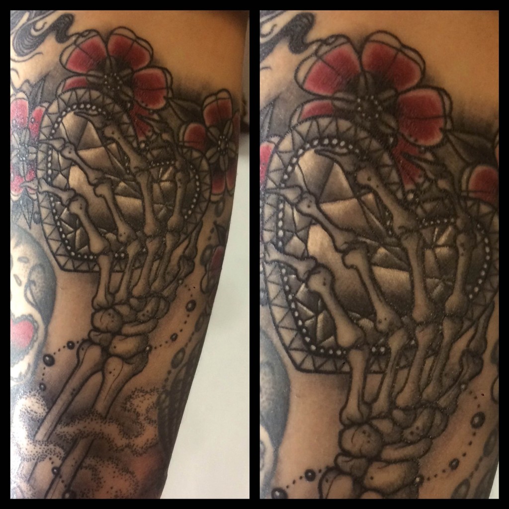 neo traditional skeleton hand and heart tattoo